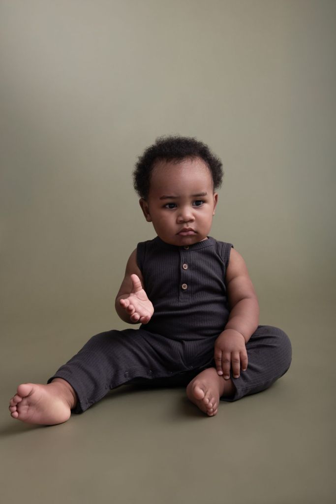Baby portrait on a sage backdrop